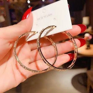 Rhodium Plated Cz Half Hoop Earring For Women